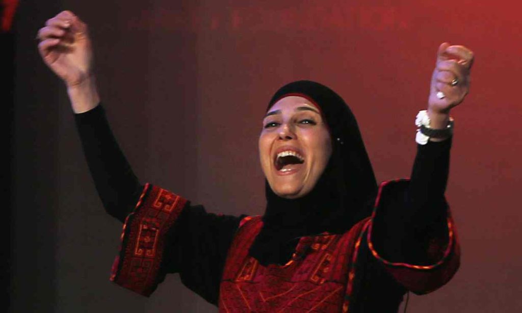 Hanan al-Hroub, a Palestinian primary school teacher, reacts after Pope Francis named her recipient of the second annual Global Teacher prize. Photograph: Kamran Jebreili/AP 