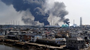 Smoke billows from fires raging at the port in Tagajo, Miyagi prefecture, March 13, 2011 following a massive earthquake and tsunami. A new explosion ripped through a troubled nuclear plant, the hydrogen blast was reported at Unit 3 of the Fukushima Daiichi nuclear plant, raising new fears of a possible nuclear meltdown. (Kim Jae-Hwan/AFP/Getty Images)
