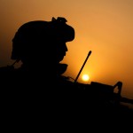 A US marine of 1/3 Marine Weapons Company is silhouetted at sunset on the northeast of Marjah on February 14, 2010. NATO commanders said the start of a major US-led offensive Operation Moshtarak. (PATRICK BAZ/AFP/Getty Images/Getty) 