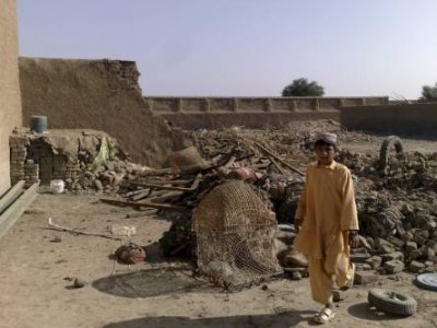A boy stands at the site of suspected U.S. drone attacks in the Janikhel tribal area in Bannu district of North West Frontier Province, Nov. 29, 2008. U.S. forces in Afghanistan have carried out at least 27 air strikes by unmanned aircraft on militant targets in northwest Pakistan this year, according to a Reuters tally, more than half of them since the beginning of September. Photo: Reuters